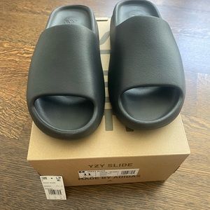 Adidas Yeezy slides. Mens size 11. Black (onyx). New in box. Never tried on